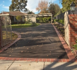 Brick Feature Asphalt Driveway and Gates