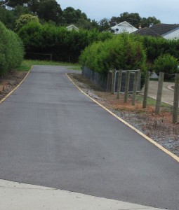 Brick edged asphalt driveway in Narre Warren North.